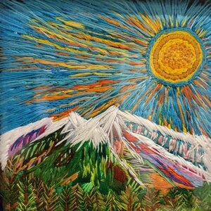 Vibrant Sunburst Mountain Embroidery Art
